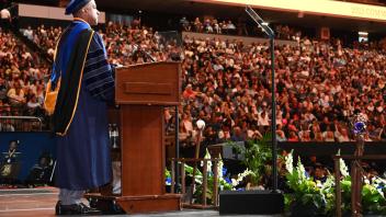Chancellor May speaking during the Spring 2023 Undergraduate Commencement at Golden 1 Center